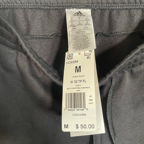 Adidas Women's Tapered Fleece Pants black/white medium - Picture 9 of 9